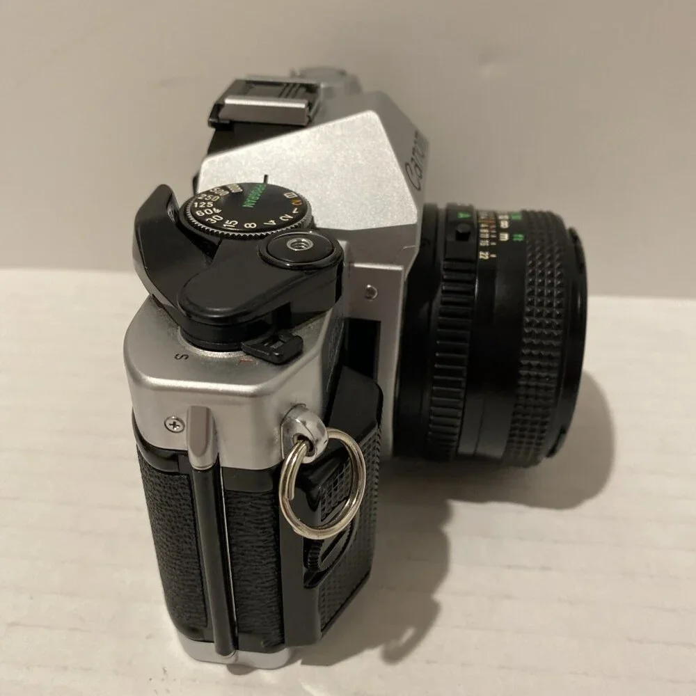 Canon Silver and Black Film Camera Kit with Lenses and Flash